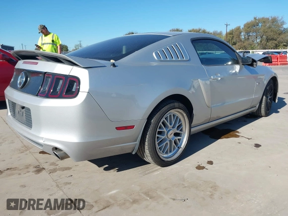 2013 Ford Mustang GT with VIN 1ZVBP8CF5D5232781, listed as a IAAI auction lot 40917812 with 130,447 mi miles. Bid and sale history available at carsss.com. Image 4.