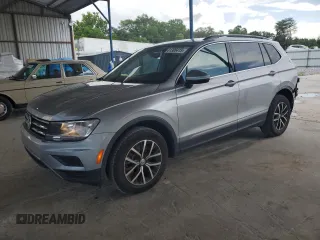 2021 Volkswagen Tiguan SE with VIN 3VV3B7AX1MM126044, listed as a Copart auction lot 61306415 with 73,159 mi miles and Salvage title. Bid and sale history available at DreamBid. Image 1.
