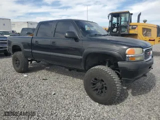 2001 GMC Sierra 2500HD SLE with VIN 1GTHK23U91F187941, listed as a Copart auction lot 77376054 with 208,303 mi miles and Salvage Title. Bid and sale history available at carsss.com. Image 4.