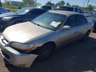 1998 Honda Accord LX with VIN 1HGCG5542WA266612, listed as a IAAI auction lot 42208066 with 202,101 mi miles and . Bid and sale history available at DreamBid. Image 2.