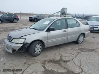 2002 Mitsubishi Lancer ES with VIN JA3AJ26E62U043039, listed as a IAAI auction lot 41600217 with 141,217 mi miles. Bid and sale history available at carsss.com. Image 17.