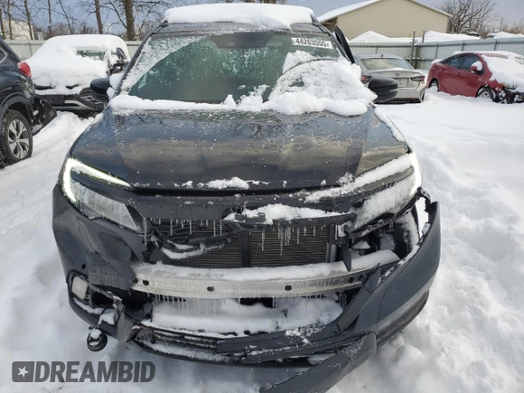 2021 Honda Passport Touring with VIN 5FNYF8H95MB018665, listed as a Copart auction lot 44263555 with 102,458 mi miles and Salvage Title. Bid and sale history available at carsss.com. Image 5.