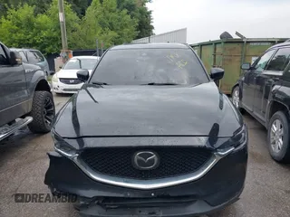 2018 Mazda CX-5 Grand Touring with VIN JM3KFBDM2J0400828, listed as a IAAI auction lot 42540846 with 254,672 mi miles and . Bid and sale history available at DreamBid. Image 12.