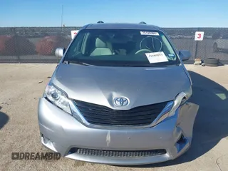 2011 Toyota Sienna LE AAS with VIN 5TDKK3DCXBS143921, listed as a IAAI auction lot 41689053 with 199,854 mi miles. Bid and sale history available at carsss.com. Image 12.