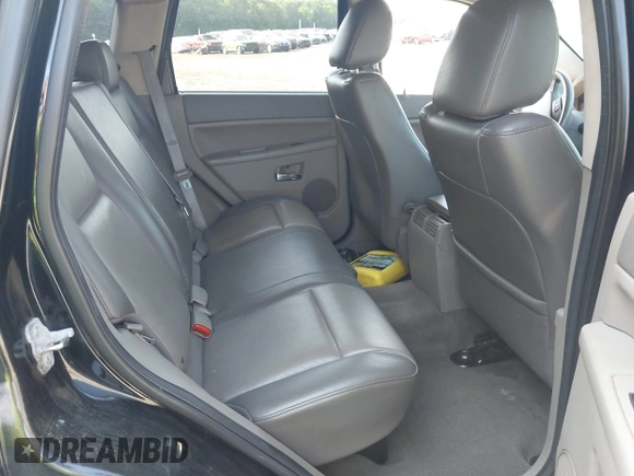 2005 Jeep Grand Cherokee Laredo z VIN 1J4GR48K65C725099, wystawiony jako IAAI lot #42509223 z przebiegiem 249 216 mil mil oraz . Historia ofert i sprzedaży dostępna na DreamBid. Obrazek 8.