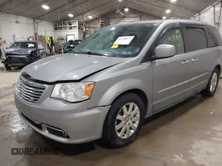 2013 Chrysler Town & Country Touring with VIN 2C4RC1BG0DR775313, listed as a IAAI auction lot 41738917 with 209,378 mi miles. Bid and sale history available at carsss.com. Image 2.