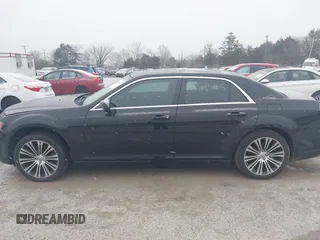 2013 Chrysler 300 with VIN 2C3CCABT7DH652797, listed as a IAAI auction lot 41602405 with 203,920 mi miles. Bid and sale history available at carsss.com. Image 14.