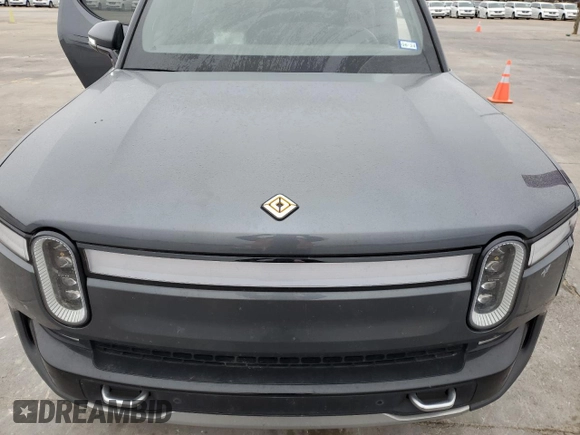 2022 Rivian R1T Launch Edition with VIN 7FCTGAAL7NN002288, listed as a Copart auction lot 43393815 with 46,927 mi miles and Salvage Title. Bid and sale history available at carsss.com. Image 11.