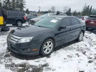 2012 Ford Fusion SE z VIN 3FAHP0HG2CR323380, wystawiony jako IAAI lot #41543660 z przebiegiem 169 059 mil mil oraz . Historia ofert i sprzedaży dostępna na DreamBid. Obrazek 17.