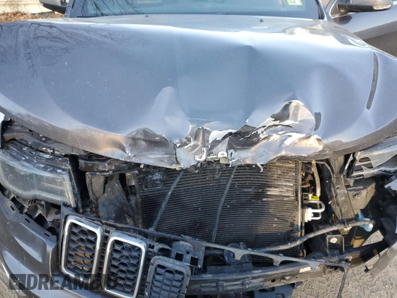 2018 Jeep Grand Cherokee Limited z VIN 1C4RJFBG7JC369651, wystawiony jako Copart lot #81523544 z przebiegiem 159 091 mil mil oraz Szkoda całkowita • Salvage title. Historia ofert i sprzedaży dostępna na DreamBid. Obrazek 12.