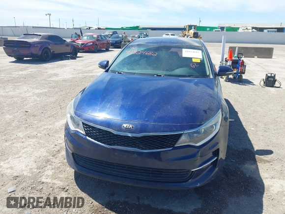 2016 Kia Optima LX Turbo with VIN 5XXGT4L13GG030586, listed as a IAAI auction lot 41824682 with 147,401 mi miles. Bid and sale history available at carsss.com. Image 6.