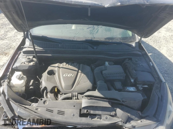 2013 Kia Optima EX z VIN 5XXGN4A77DG199443, wystawiony jako Copart lot #62406035 z przebiegiem 171 081 mil mil oraz Szkoda całkowita • Salvage title. Historia ofert i sprzedaży dostępna na DreamBid. Obrazek 11.