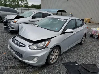 2013 Hyundai Accent GLS z VIN KMHCU4AE6DU460292, wystawiony jako Copart lot #56656225 z przebiegiem 151 031 mil mil oraz Szkoda całkowita • Salvage title. Historia ofert i sprzedaży dostępna na DreamBid. Obrazek 1.