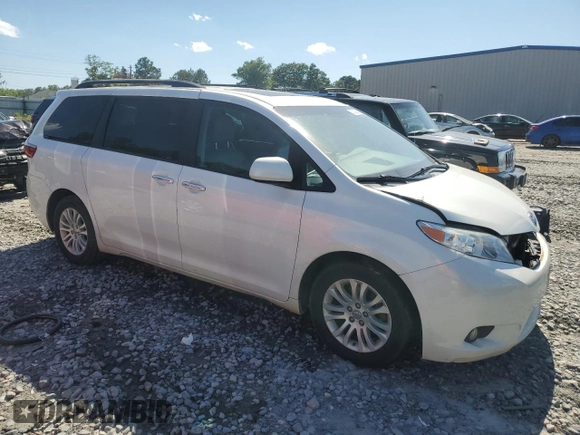 2015 Toyota Sienna XLE with VIN 5TDYK3DC3FS624612, listed as a Copart auction lot 57309295 with 188,467 mi miles and Salvage title. Bid and sale history available at DreamBid. Image 4.