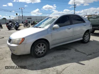 2005 Kia Spectra LX z VIN KNAFE122X55187531, wystawiony jako Copart lot #48812035 z przebiegiem 213 461 mil mil oraz Szkoda całkowita • Salvage title. Historia ofert i sprzedaży dostępna na DreamBid. Obrazek 1.