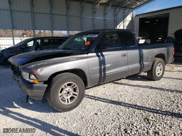 2001 Dodge Dakota with VIN 1B7GL22X01S343098, listed as a Copart auction lot 81063554 with 212,784 mi miles and Salvage Title. Bid and sale history available at carsss.com. Image 1.