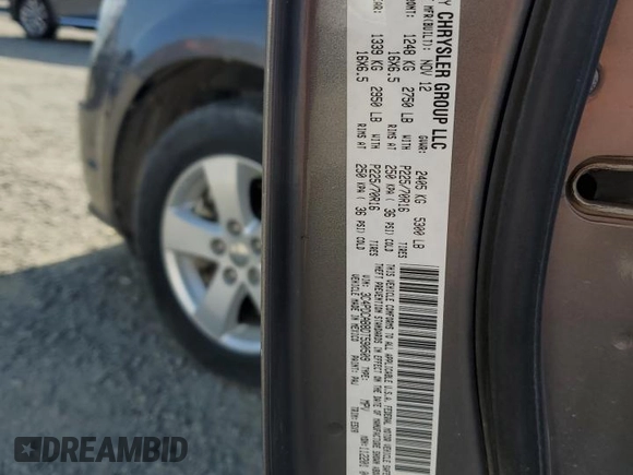 2013 Dodge Journey American Value with VIN 3C4PDCAB8DT590509, listed as a Copart auction lot 57347375 with 203,642 mi miles and Clean title. Bid and sale history available at DreamBid. Image 13.