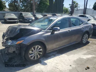 2023 Toyota Camry LE z VIN 4T1C11AK9PU801105, wystawiony jako Copart lot #57997715 z przebiegiem 50 491 mil mil oraz Szkoda całkowita • Salvage title. Historia ofert i sprzedaży dostępna na DreamBid. Obrazek 1.