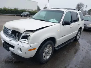 2002 Mercury Mountaineer Convenience z VIN 4M2ZU86W12ZJ35003, wystawiony jako IAAI lot #41193635 z przebiegiem 168 601 mil mil oraz . Historia ofert i sprzedaży dostępna na DreamBid. Obrazek 2.