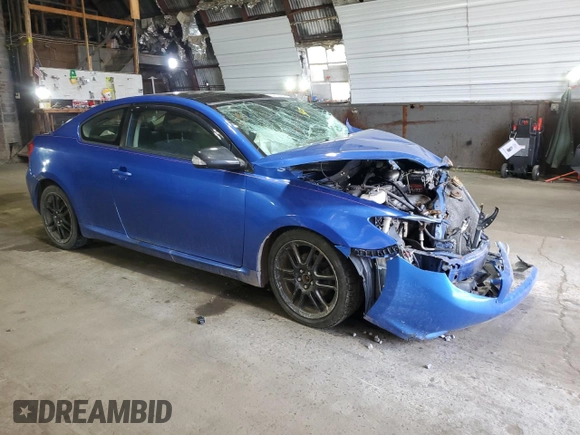 2006 Scion tC z VIN JTKDE167660131545, wystawiony jako Copart lot #54702365 z przebiegiem Nie podano mil oraz Szkoda całkowita • Salvage title. Historia ofert i sprzedaży dostępna na DreamBid. Obrazek 4.