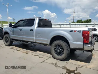 2020 Ford F-250 XL with VIN 1FT7W2BN9LED33306, listed as a Copart auction lot 60313975 with 93,971 mi miles and Salvage title. Bid and sale history available at DreamBid. Image 2.