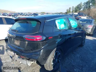 2023 Chevrolet Bolt EV 2LT with VIN 1G1FX6S05P4162790, listed as a IAAI auction lot 41549658 with 54,779 mi miles. Bid and sale history available at carsss.com. Image 4.