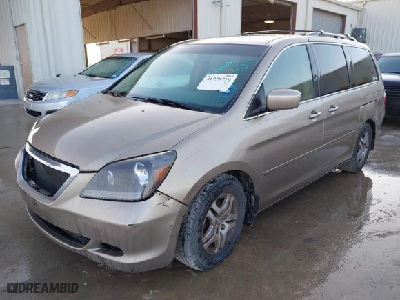 2005 Honda Odyssey EX-L with VIN 5FNRL38735B015831, listed as a IAAI auction lot 41730710 with 295,586 mi miles. Bid and sale history available at carsss.com. Image 2.