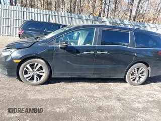 2024 Honda Odyssey Touring z VIN 5FNRL6H89RB042354, wystawiony jako IAAI lot #41469495 z przebiegiem 8 477 mil mil oraz . Historia ofert i sprzedaży dostępna na DreamBid. Obrazek 14.
