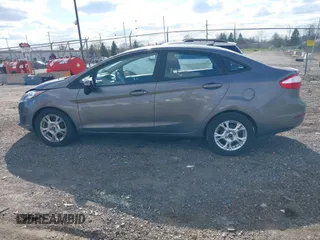 2014 Ford Fiesta SE with VIN 3FADP4BJ1EM199936, listed as a IAAI auction lot 41988670 with 44,846 mi miles and . Bid and sale history available at DreamBid. Image 14.