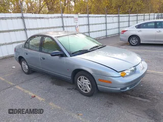 2002 Saturn SL z VIN 1G8ZS528327278417, wystawiony jako IAAI lot #40611406 z przebiegiem 227 283 mil mil oraz . Historia ofert i sprzedaży dostępna na DreamBid. Obrazek 1.