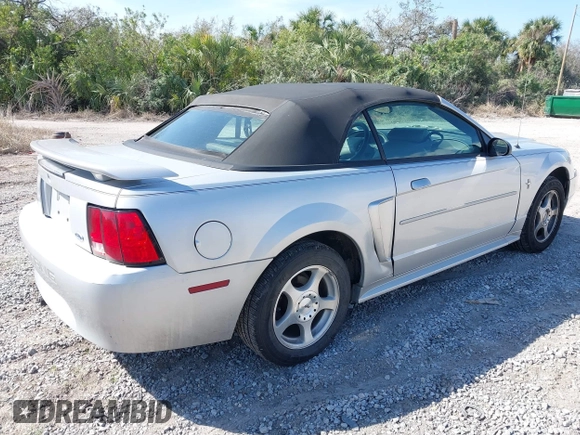 2003 Ford Mustang Deluxe z VIN 1FAFP44453F379157, wystawiony jako IAAI lot #41612382 z przebiegiem 107 599 mil mil oraz . Historia ofert i sprzedaży dostępna na DreamBid. Obrazek 4.