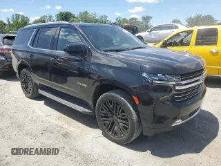 2021 Chevrolet Tahoe LT with VIN 1GNSKNKD4MR262628, listed as a Copart auction lot 54875235 with 90,533 mi miles and Salvage title. Bid and sale history available at DreamBid. Image 4.