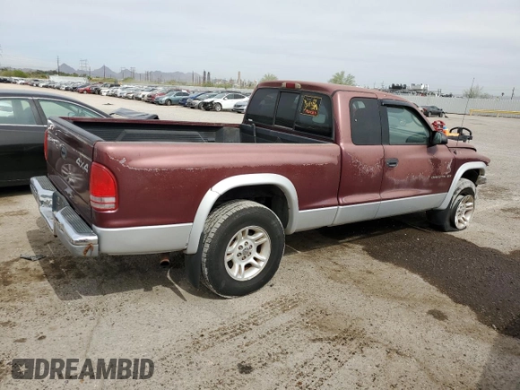 2001 Dodge Dakota Sport z VIN 1B7GG22N81S152399, wystawiony jako Copart lot #58543135 z przebiegiem 218 133 mil mil oraz Szkoda całkowita • Salvage title. Historia ofert i sprzedaży dostępna na DreamBid. Obrazek 3.