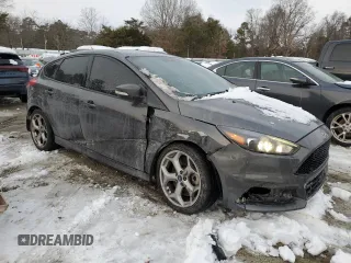 2018 Ford Focus ST with VIN 1FADP3L98JL291877, listed as a Copart auction lot 87465024 with 67,539 mi miles and Salvage Title. Bid and sale history available at DreamBid. Image 4.