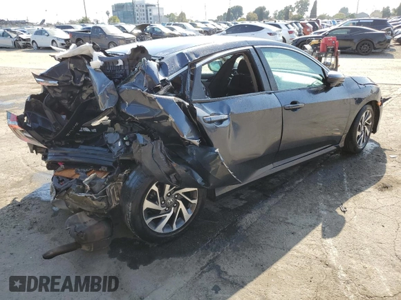 2016 Honda Civic EX with VIN 19XFC2F70GE214585, listed as a Copart auction lot 55607165 with 148,528 mi miles and Salvage Title. Bid and sale history available at DreamBid. Image 3.