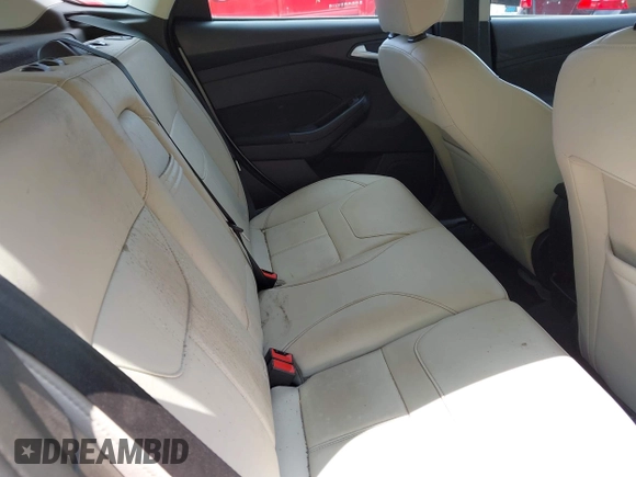 2016 Ford Focus Titanium with VIN 1FADP3N26GL332709, listed as a IAAI auction lot 42458997 with 75,509 mi miles and . Bid and sale history available at DreamBid. Image 8.