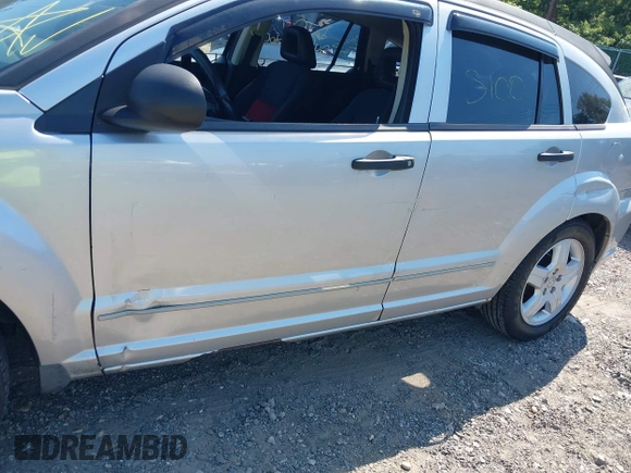 2008 Dodge Caliber SXT with VIN 1B3HB48B48D594124, listed as a IAAI auction lot 40282351 with 142,615 mi miles. Bid and sale history available at carsss.com. Image 6.