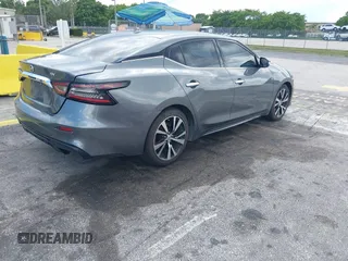 2020 Nissan Maxima SV z VIN 1N4AA6CV6LC373659, wystawiony jako IAAI lot #42347264 z przebiegiem 77 812 mil mil oraz . Historia ofert i sprzedaży dostępna na DreamBid. Obrazek 4.