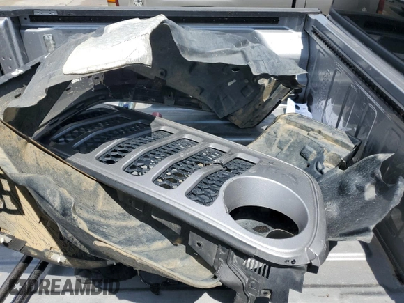 2020 Jeep Gladiator Sport S with VIN 1C6JJTAG9LL149872, listed as a Copart auction lot 58518095 with 118,910 mi miles and Salvage title. Bid and sale history available at DreamBid. Image 12.
