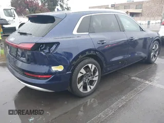 2022 Audi e-tron Premium Plus with VIN WA1LAAGE5NB022695, listed as a IAAI auction lot 41181338 with 14,711 mi miles and . Bid and sale history available at DreamBid. Image 4.