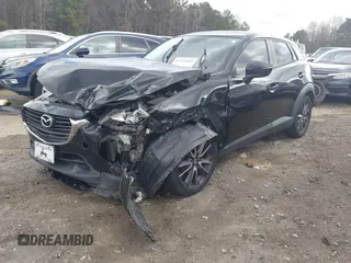 2017 Mazda CX-3 Touring with VIN JM1DKFC70H0163315, listed as a IAAI auction lot 41721515 with 144,662 mi miles. Bid and sale history available at carsss.com. Image 2.