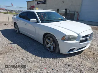 2012 Dodge Charger SE with VIN 2C3CDXBG1CH211300, listed as a IAAI auction lot 42049480 with 156,303 mi miles. Bid and sale history available at carsss.com. Image 1.