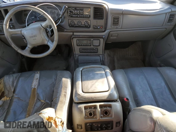 2001 GMC Yukon Denali с VIN 1GKEK63U01J253479, выставлен на аукционе Copart как лот 83272054 с пробегом 217 364 миль миль и Чистый • Clean title. История ставок и продаж доступна на DreamBid. Изображение 8.