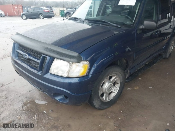 2004 Ford Explorer Sport Trac XLS with VIN 1FMZU77K84UB98509, listed as a IAAI auction lot 41557833 with 1 mi miles. Bid and sale history available at carsss.com. Image 6.