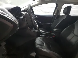2015 Ford Focus Titanium with VIN 1FADP3N2XFL321128, listed as a Copart auction lot 50796845 with 156,700 mi miles and Clean Title. Bid and sale history available at carsss.com. Image 7.