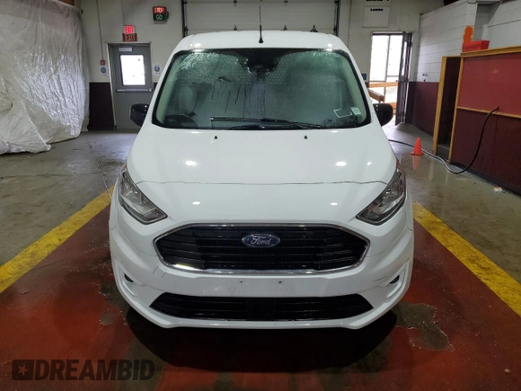 2020 Ford Transit Connect XLT z VIN NM0GS9F27L1436247, wystawiony jako Copart lot #56520525 z przebiegiem 92 557 mil mil oraz Czysty tytuł • Clean title. Historia ofert i sprzedaży dostępna na DreamBid. Obrazek 5.