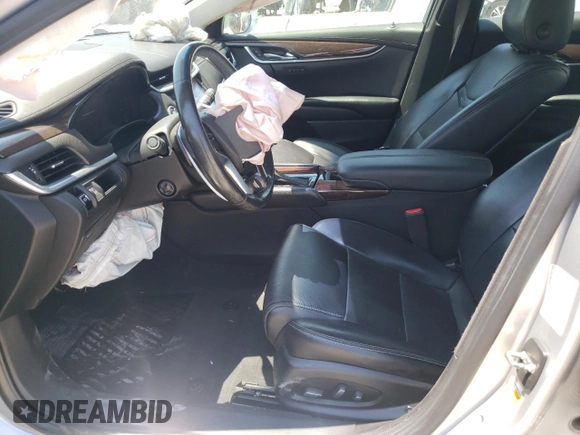 2016 Cadillac XTS Luxury Collection with VIN 2G61N5S35G9197325, listed as a Copart auction lot 55613225 with 131,404 mi miles and Salvage title. Bid and sale history available at DreamBid. Image 7.