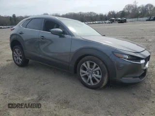 2024 Mazda CX-30 S Premium z VIN 3MVDMBDM1RM630617, wystawiony jako Copart lot #54355095 z przebiegiem 9 634 mil mil oraz Szkoda całkowita • Salvage title. Historia ofert i sprzedaży dostępna na DreamBid. Obrazek 4.