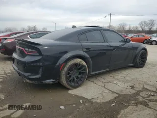 2021 Dodge Charger Scat Pack with VIN 2C3CDXGJ7MH584590, listed as a Copart auction lot 46396325 with 51,257 mi miles and Salvage Title. Bid and sale history available at DreamBid. Image 3.