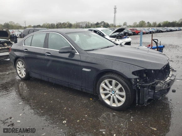 2016 BMW 5 Series 535i xDrive with VIN WBA5B3C53GG253675, listed as a Copart auction lot 52315735 with 154,156 mi miles and Salvage Title. Bid and sale history available at carsss.com. Image 4.